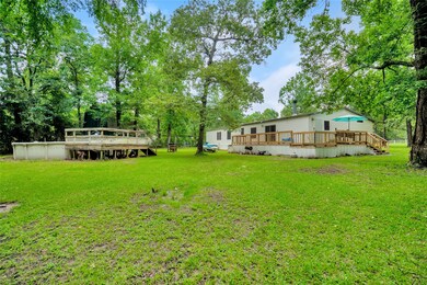 Back yard features a nice area to entertain.