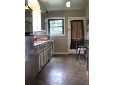 Kitchen. Kitchen equipped with refrigerator and st