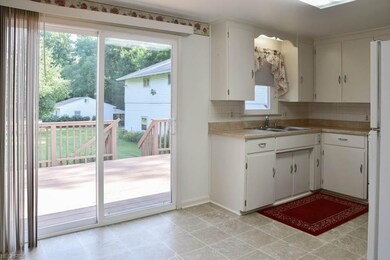 Dinette with a sliding door to the deck.
