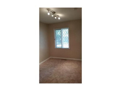 Bedroom one, new paint and carpet.