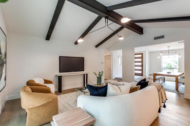 Living room featuring light wood finished floors,