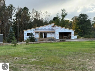 9890 Cushman Ct unit 4, Williamsburg, MI 49690 - photo 5