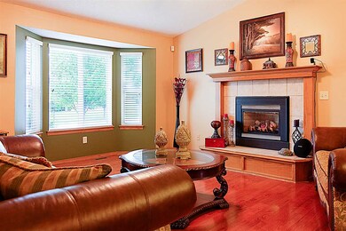 Large bay window in living room.