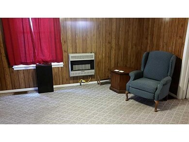 Exterior Front. Apt B Living Room