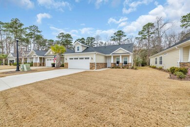 View of front of property with a garage and a fron