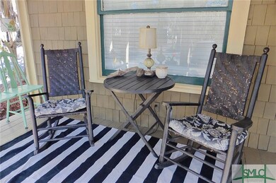 Cozy front porch but plenty of room for your rocki