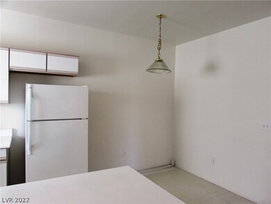 Dining Area and Partial Kitchen