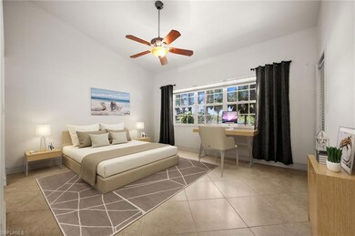 Bedroom featuring lofted ceiling, tile patterned f