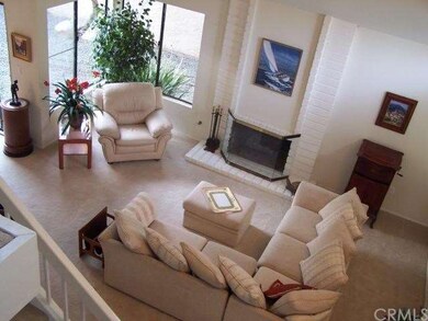The Living Room from upstairs balcony showing Fire