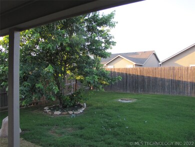 Covered Patio with Ceiling Fan and fully fenced ba
