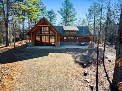 Back of house with a patio area