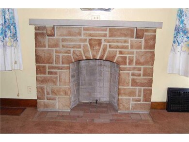 Living Room. stone fireplace in living room