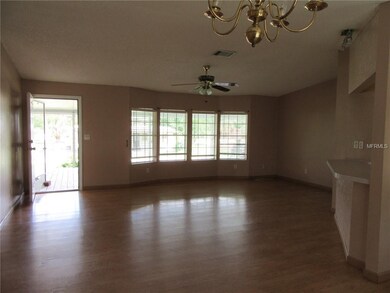Large living room with laminate flooring throughou