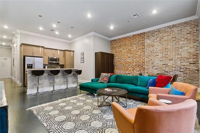 Living room, kitchen, side hallway and unit entran