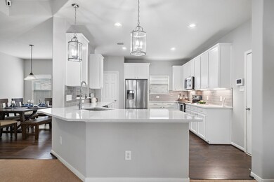 Updated, white and bright kitchen!  Beautiful cabinetry.