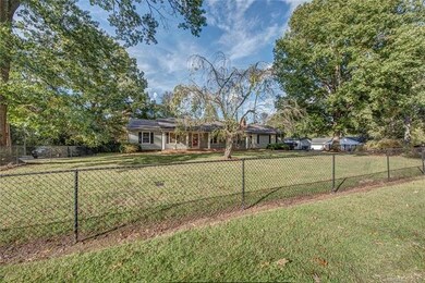 Front View with fenced front yard