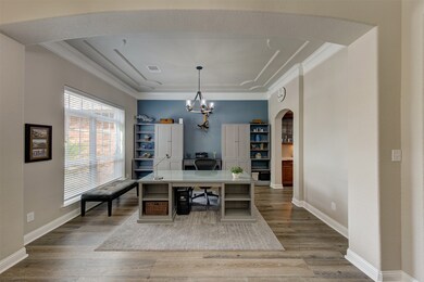 Stunning ceiling accents, deep crown molding & bas