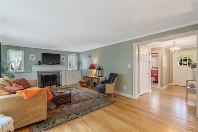 The fabulous pegged oak hardwood floors gleam as w