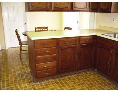 Kitchen. Ample wood cabinetry and ready for your p