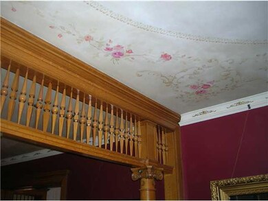 Living Room. Handcarved fret work between the fron