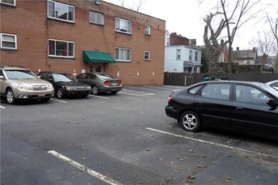 One off street assigned parking space comes with t