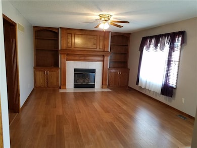 Gorgeous wood built-ins & gas fireplace