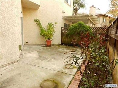 Fenced Backyard with Large Patio