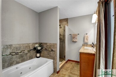 Primary ensuite with jacuzzi tub