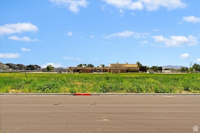 View of asphalt street featuring a mountain view