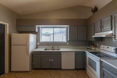 KITCHEN WITH FRESHLY PAINTED CABINETS