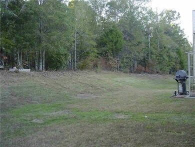 Back yard backs up to wooded area