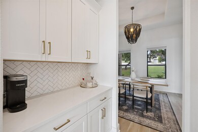Kitchen featuring light wood-style flooring, deco