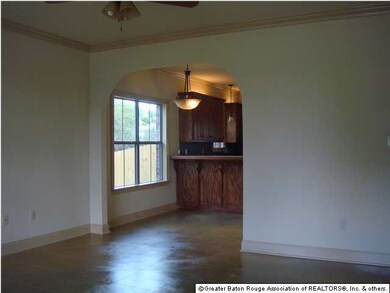 Wonderful Open Floor Plan features stained concret