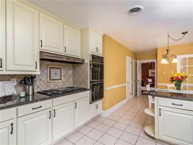 Kitchen overlooking breakfast area.