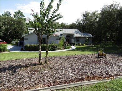 MANICURED LAWN AND FRONT OF HOUSE