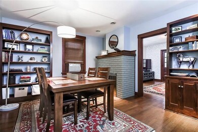 The Dining Area is Charming with Built-In Shelving