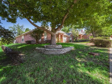 Ranch-style house with a front lawn