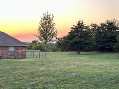 View of yard at dusk