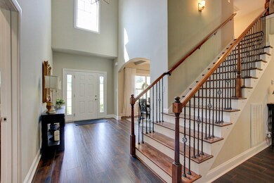 View of Foyer and Hardwood Staircase