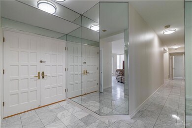 Foyer and view of long hallway with all bedrooms and bathrooms