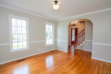 Front Formal Dining with bright sunny windows and