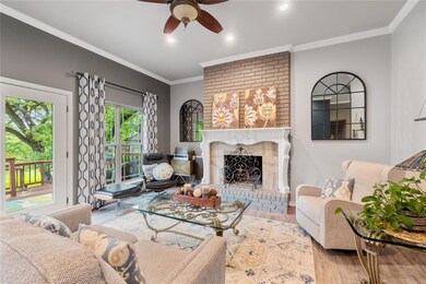 Main Floor Living Room with High Ceiling and Gas Burning Fireplace