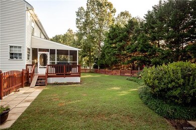 Exterior View of Screened-In Porch and yard!