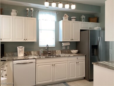 Kitchen featuring dishwashing machine, decorative
