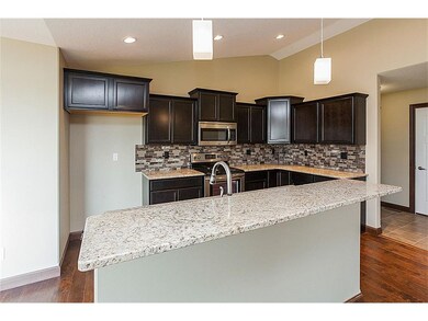 Kitchen - island with raised seating area