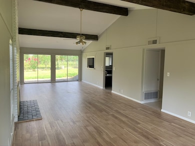 On the back side of the living room there is two s