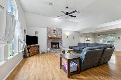Beautiful open living room with vaulted ceiling an