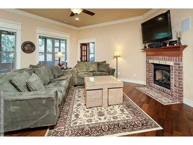Living Room. Hard wood floors and custom molding &
