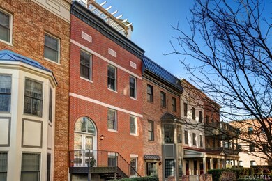 Beautiful brick townhouse with a roof-top deck in