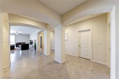 Foyer with ceramic tile floors throughout, carpet